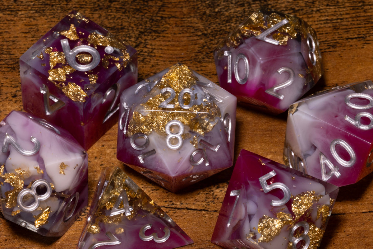 Royal Orchid 7-Piece Sharp Edge Dice Set – Magenta and White with Gold Flakes