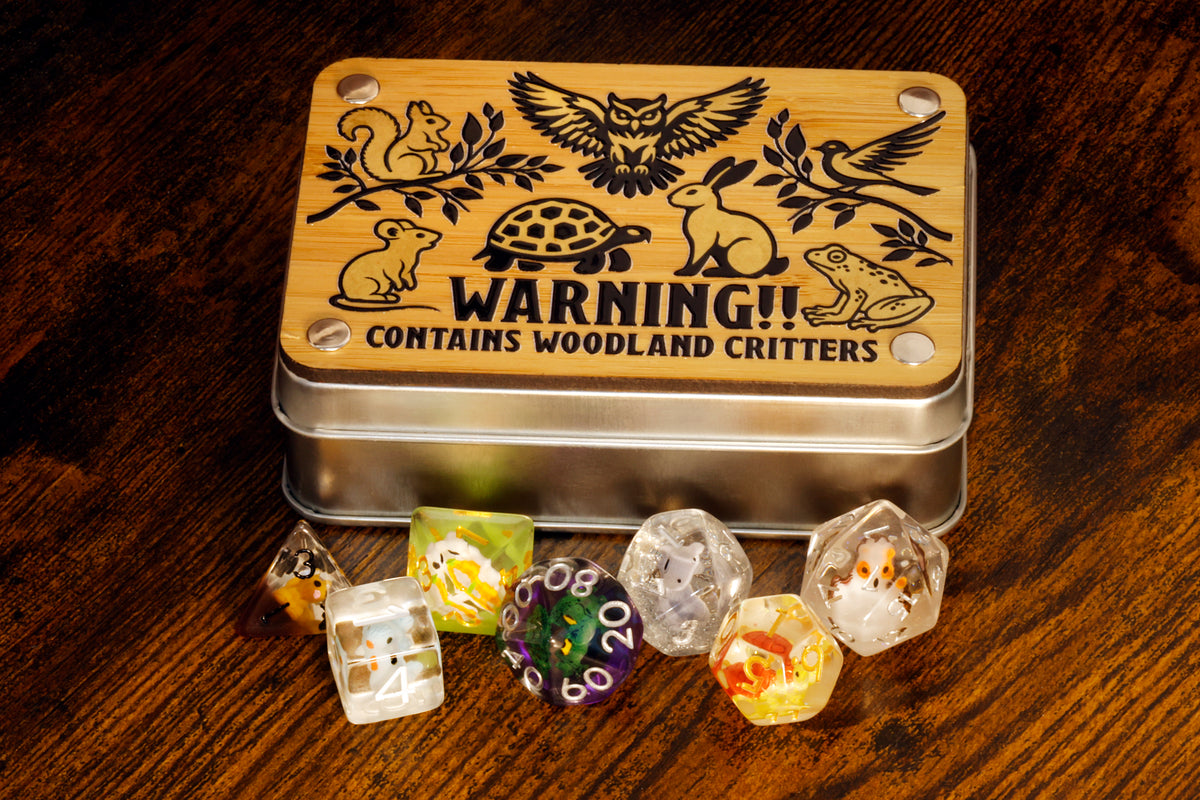 a tin with dices sitting on top of a wooden table