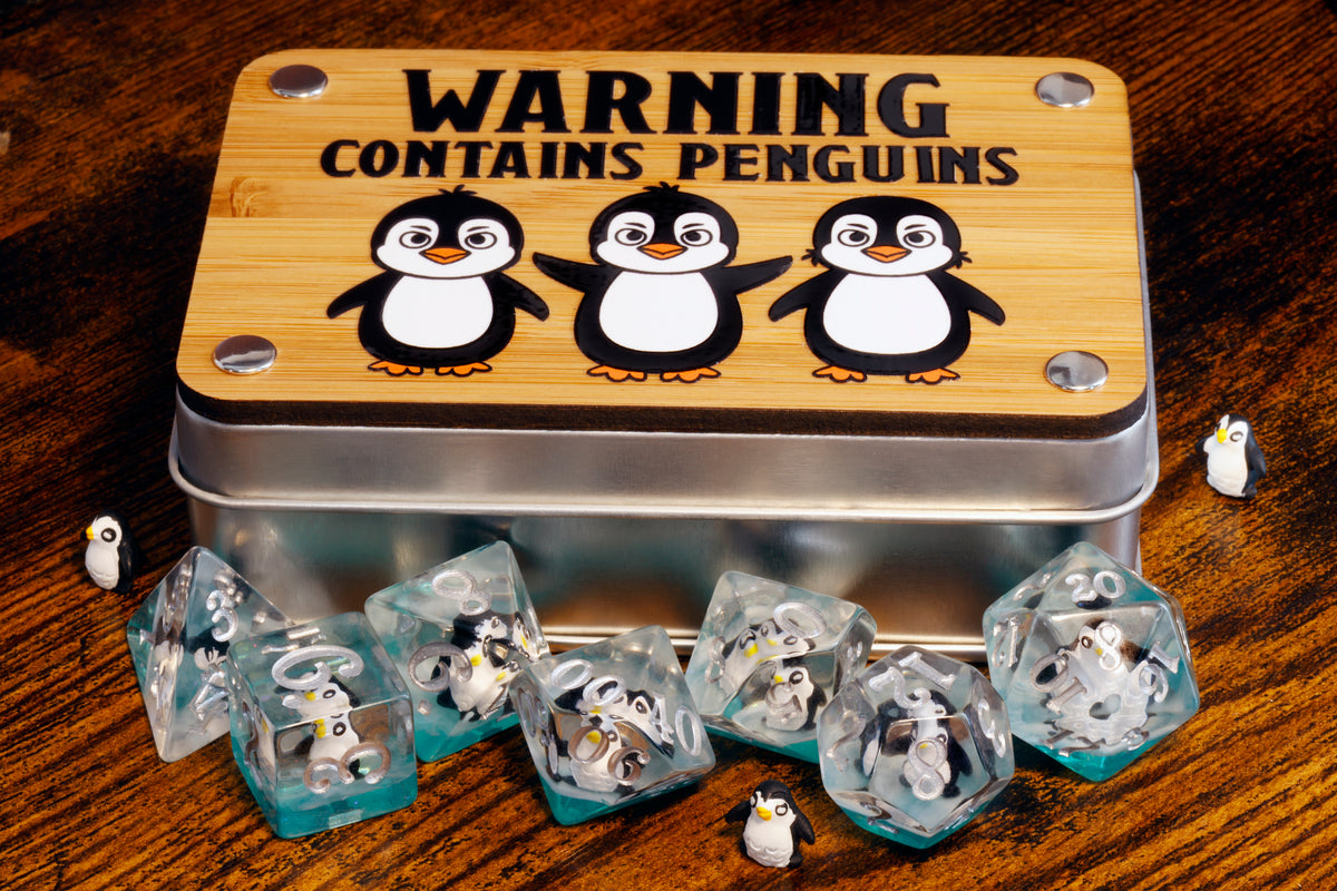 a tin with penguins on it sitting on a table