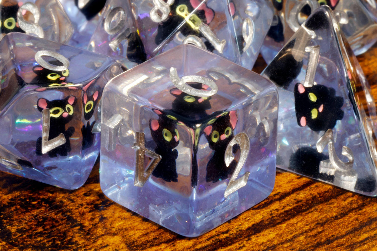 Black cat resin dice set with purple glitter layer and silver numbers - The Wizard's Vault