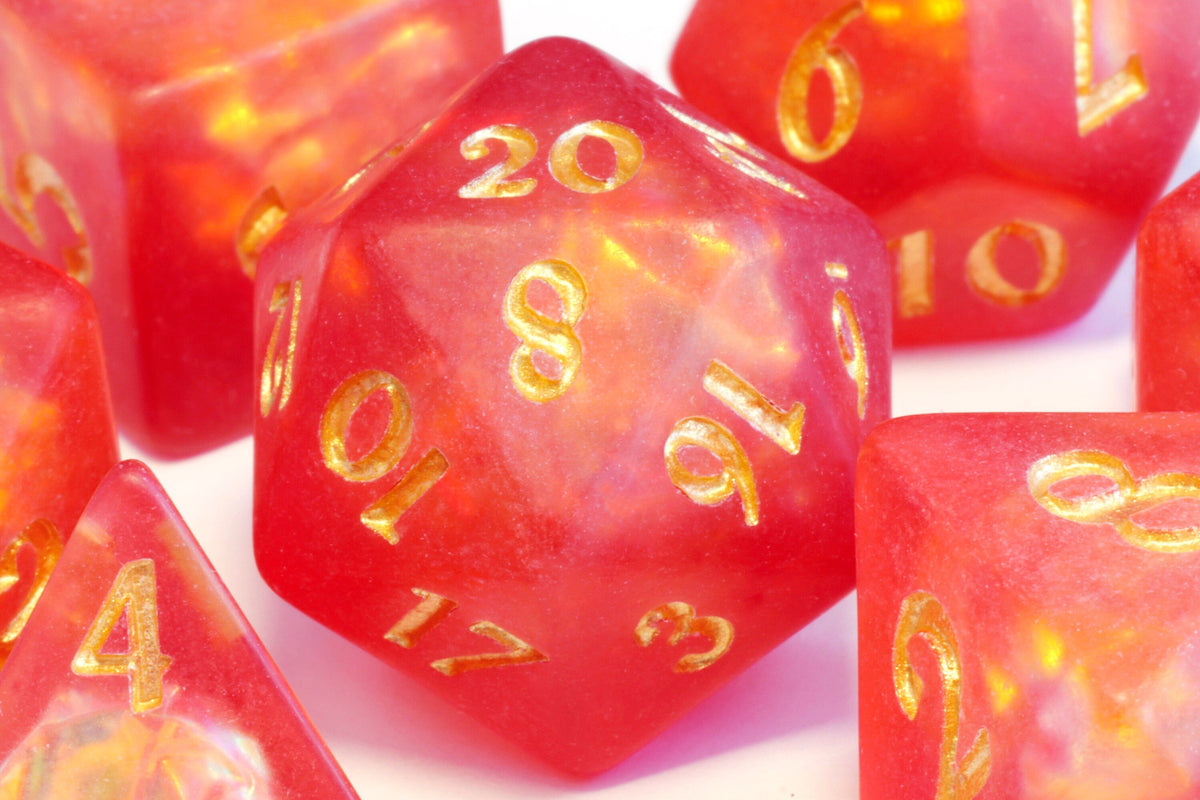 Dragon's Breath dice set, red-orange frosted resin with holographic inclusions