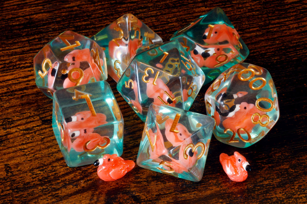 Flamingo 7-piece polyhedral dice set with miniature flamingo inclusions