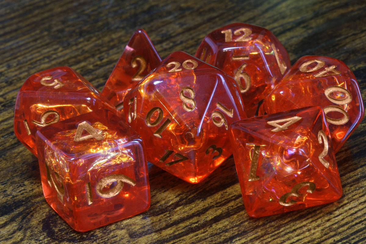 Fire Opal 7-Piece Dice Set – Transparent Red with Holographic Inclusions & Glitter - The Wizard's Vault