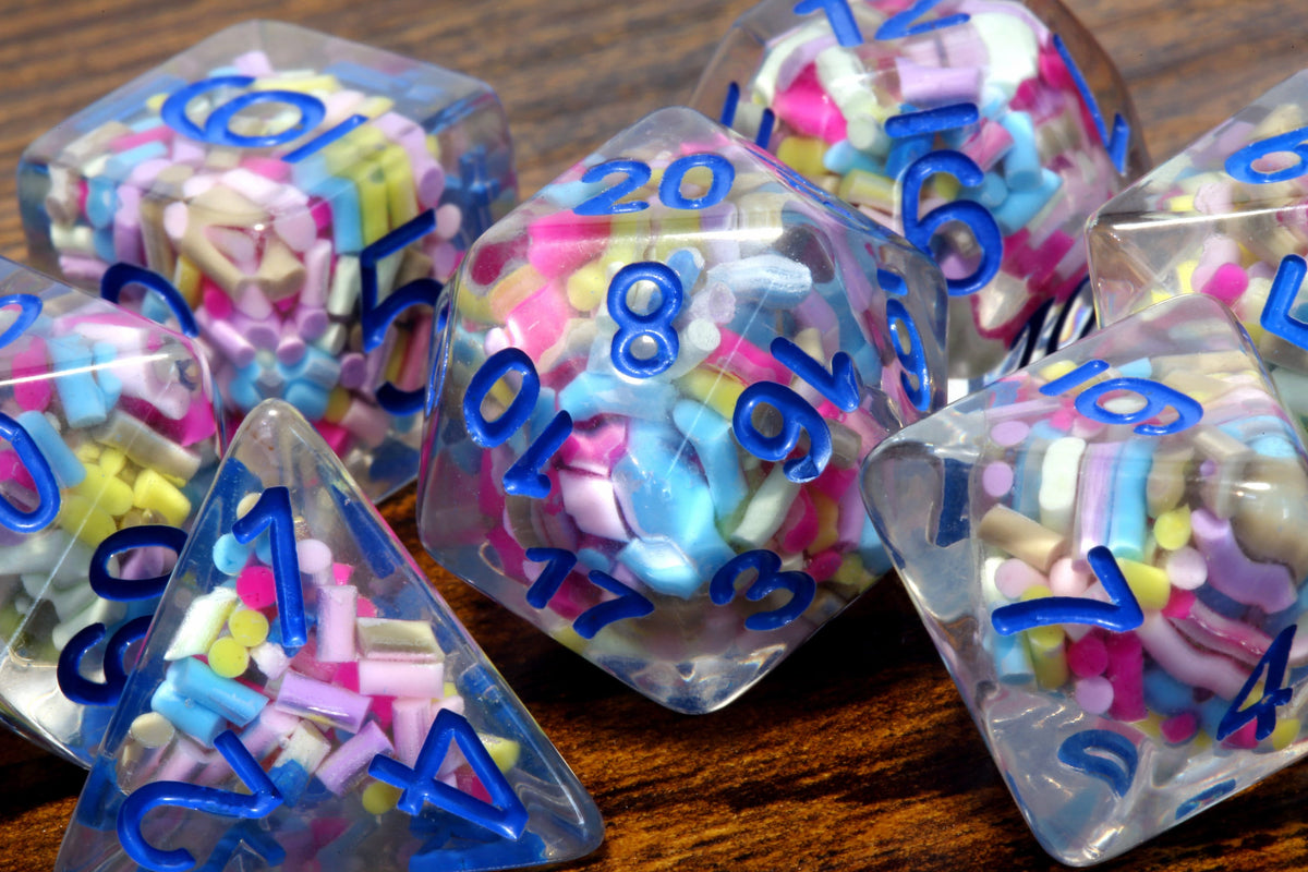 Funfetti cake dice set - Sprinkle core DND Dice, Colorful sprinkles in a clear resin & blue font, Perfect Dungeon Master Birthday Gift - The Wizard's Vault
