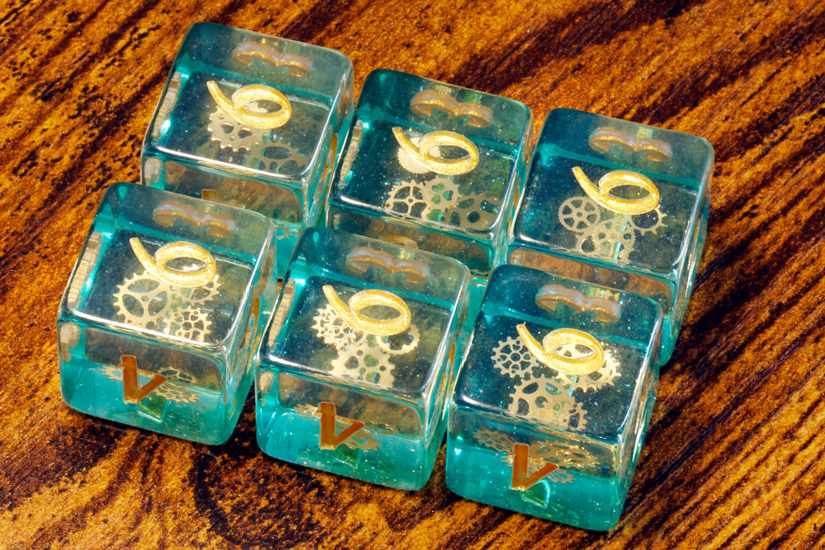 Ethereal Sprockets D6 Dice, Blue green glittery layer with small golden gear inclusions - The Wizard's Vault