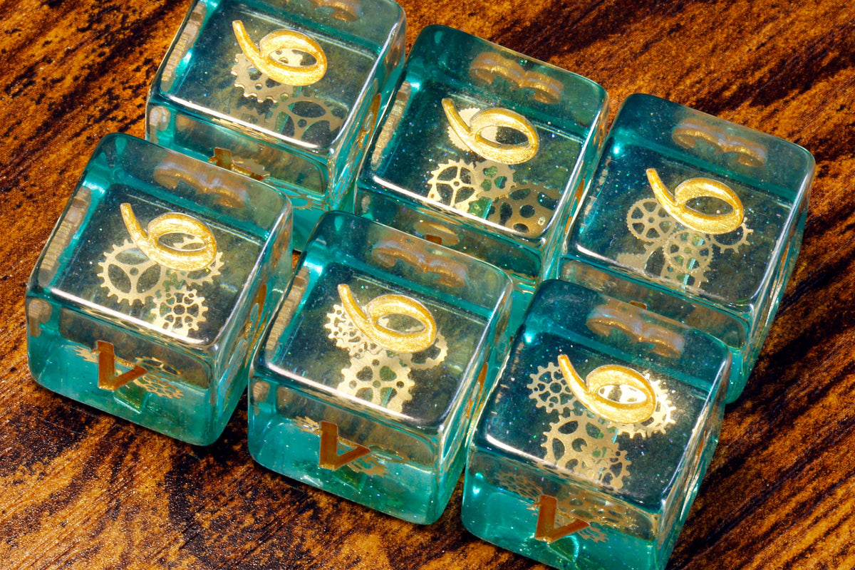 Ethereal Sprockets D6 Dice, Blue green glittery layer with small golden gear inclusions - The Wizard's Vault