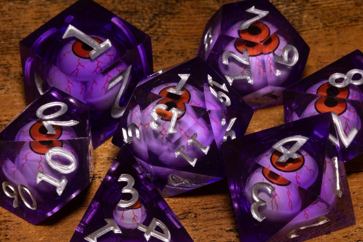 Fiend's Gaze 7-Piece Liquid Core Dice Set – Sharp Edge with Red Moving Eyes