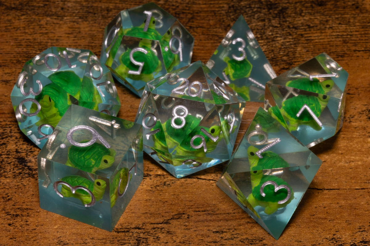 Turtle Cove 7-Piece Sharp Edge Dice Set – Pale Blue with Turtle Inclusions