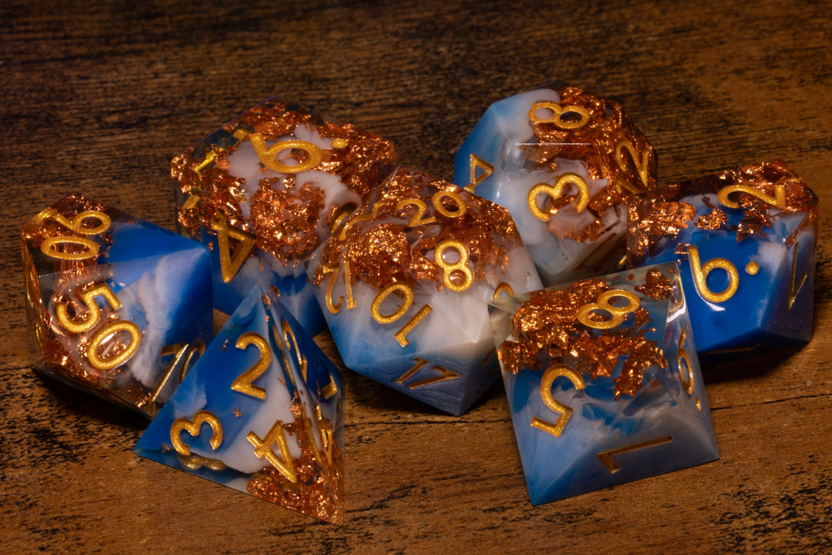 Sapphire Sky 7-Piece Sharp Edge Dice Set – Royal Blue and White with Copper Flakes