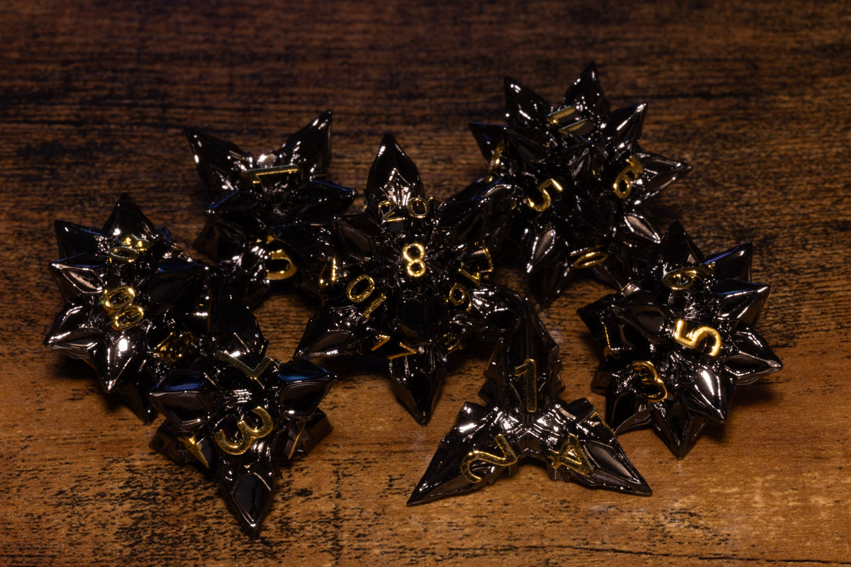 Blooming Stars 7-Piece Metal Dice Set – Gunmetal with Gold Numbers