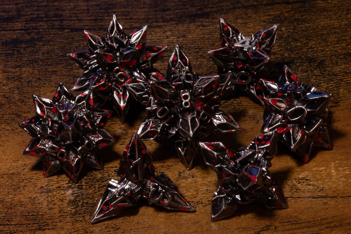 Blooming Stars 7-Piece Metal Dice Set – Antique Silver with Red Splatter