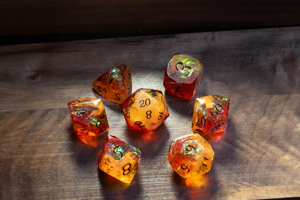 Amber Opal sharp-edge dice set arranged in a circle on wood