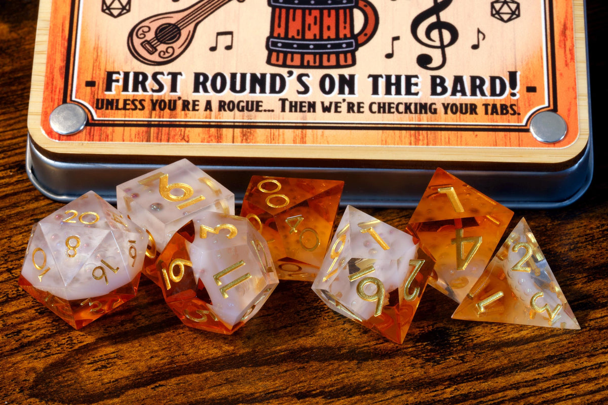 Bard’s Brew 7-piece polyhedral dice set in golden ale tones