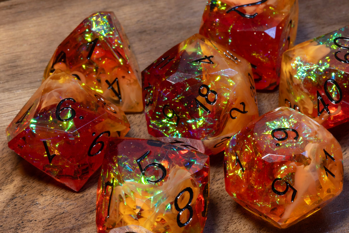 Close-up of Amber Opal sharp-edge dice showing the holographic foil