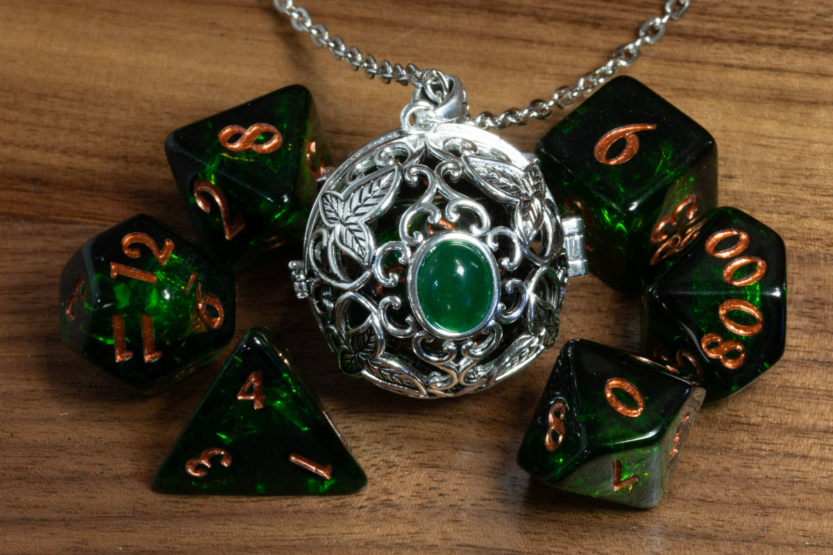 Elvish leaves pendant in a silver finish holding a D20