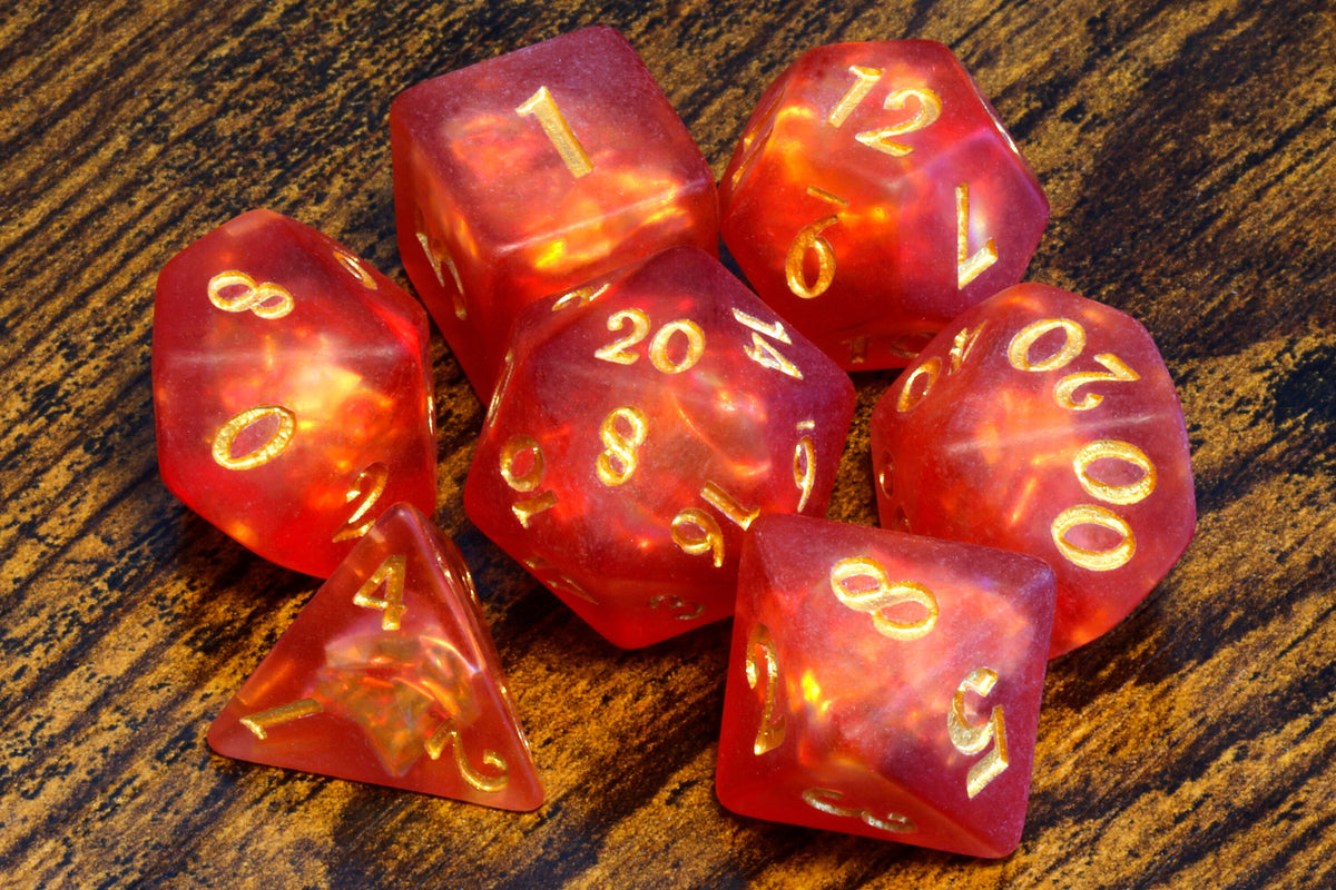 Dragon's Breath dice set, red-orange frosted resin with holographic inclusions