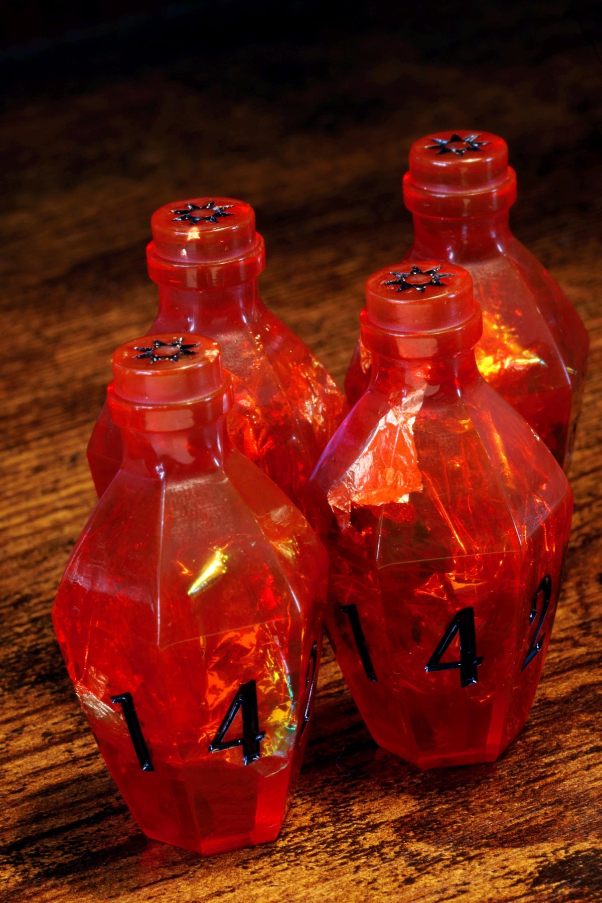 Vampire's Kiss Elixir D6 Potion Dice – Red Sharp Edge with Holographic Foil and Gold Flakes - The Wizard's Vault