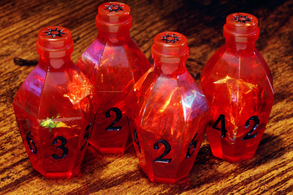 Vampire's Kiss Elixir D6 Potion Dice – Red Sharp Edge with Holographic Foil and Gold Flakes - The Wizard's Vault