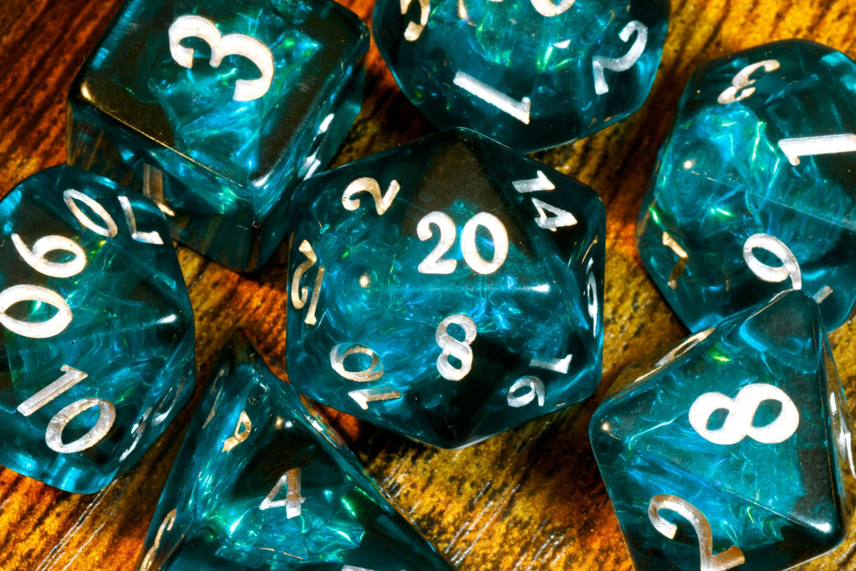 Abyssal Opal 7-Piece Dice Set – Dark Teal Blue with Holographic Foil - The Wizard's Vault