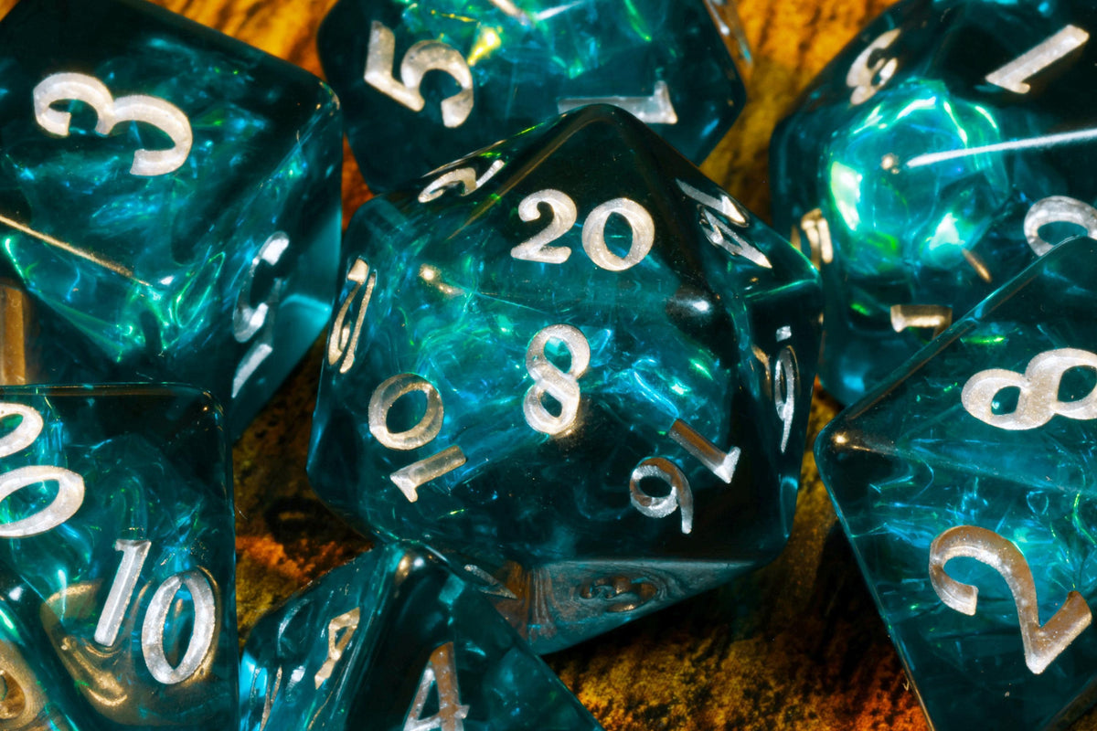 Abyssal Opal 7-Piece Dice Set – Dark Teal Blue with Holographic Foil - The Wizard's Vault