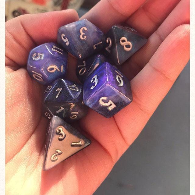 Dreamveil Opal 7-Piece Dice Set – Semi-Opaque with Iridescent Blue and Purple Glitter - The Wizard's Vault