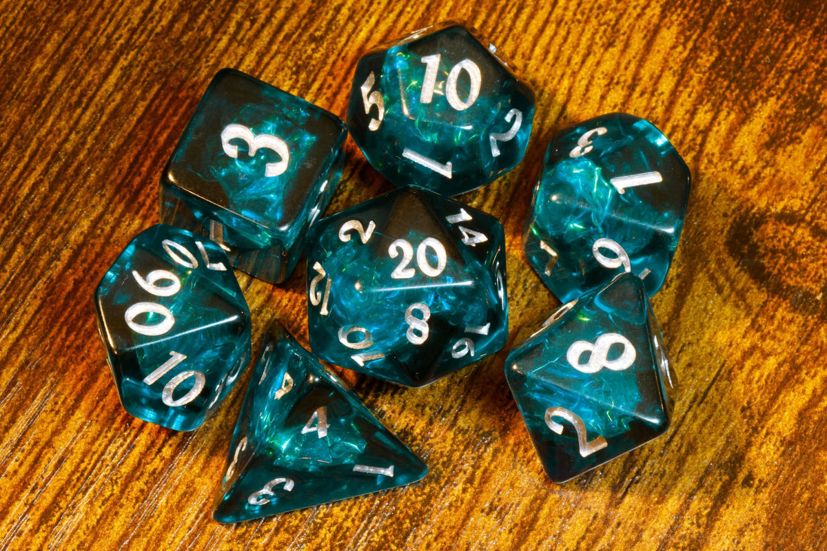 Abyssal Opal 7-Piece Dice Set – Dark Teal Blue with Holographic Foil - The Wizard's Vault