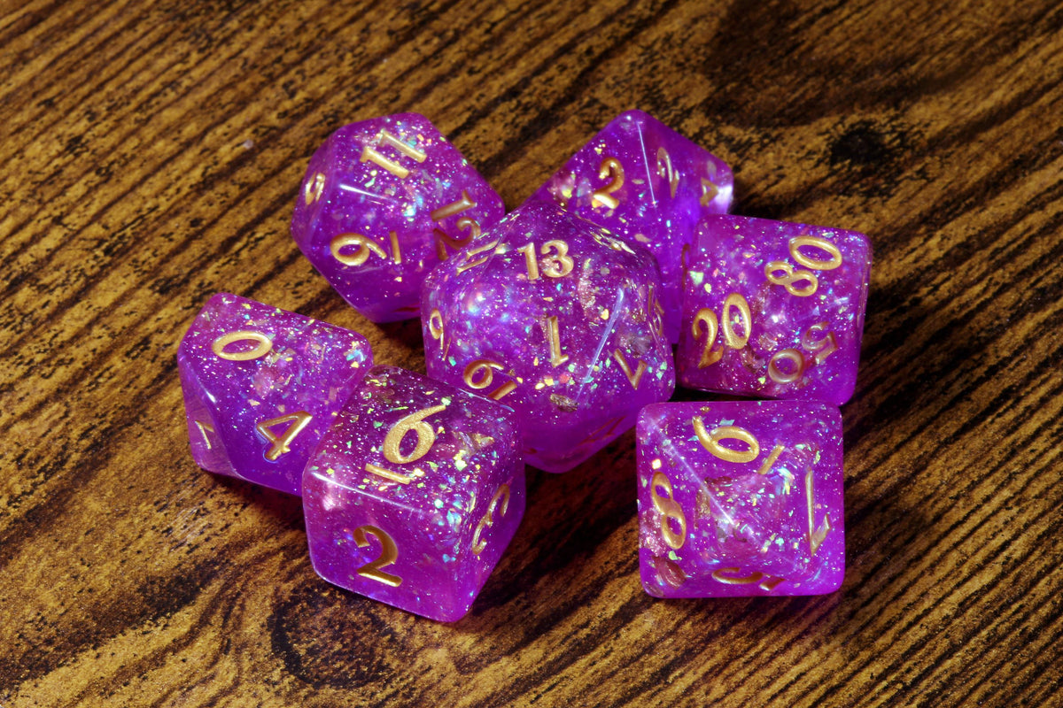 Oracleshard Opal 7-Piece Dice Set – Purple Magenta Translucent Holographic Glitter and Gold Flakes - The Wizard's Vault