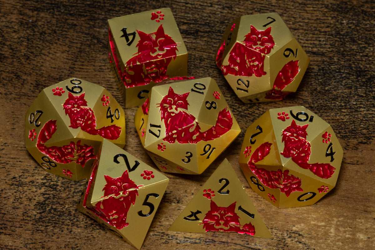 Meowgic 7-Piece Metal Dice Set – Gold with Red Cats – photo 1