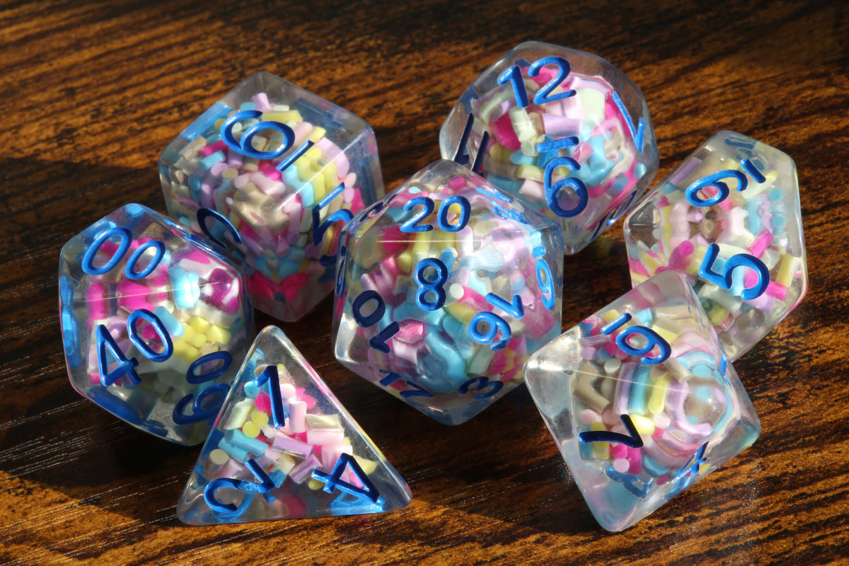 Funfetti cake dice set -  Sprinkle core DND Dice, Colorful sprinkles in a clear resin & blue font, Perfect Dungeon Master Birthday Gift - The Wizard's Vault