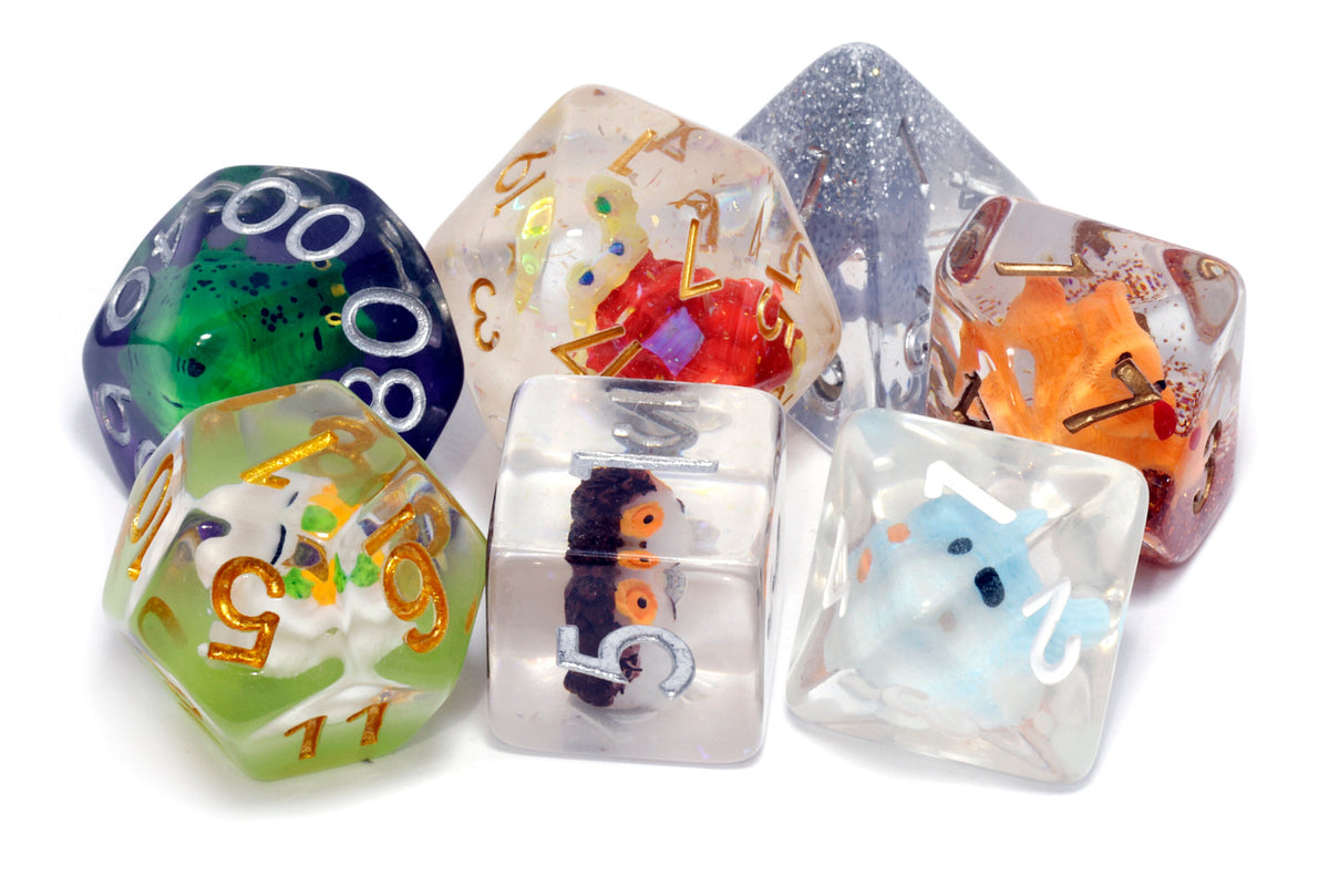 Resin polyhedral dice with woodland animal inclusions